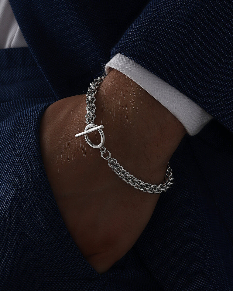 T-bar Chain Bracelet in Sterling Silver plated-316L stainless steel from Waldor & Co. The model is Avant Chain Polished.