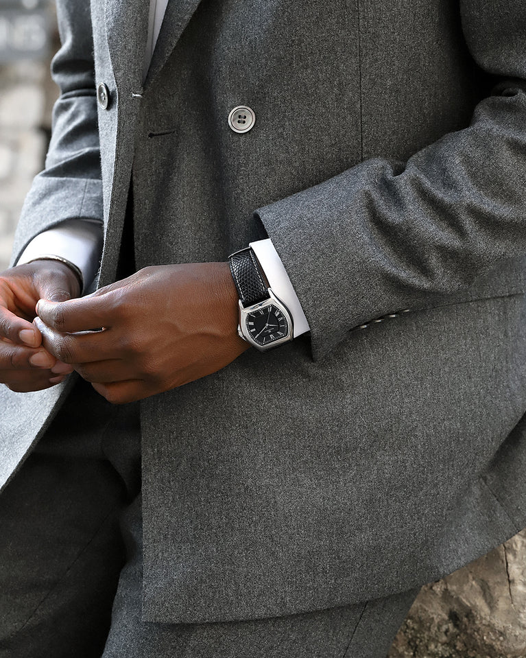 A square mens watch in Rhodium-plated 316L stainless steel from Waldor & Co. with white dial. Ronda movement. The model is Constant 40 Tremezzo 37x45mm.