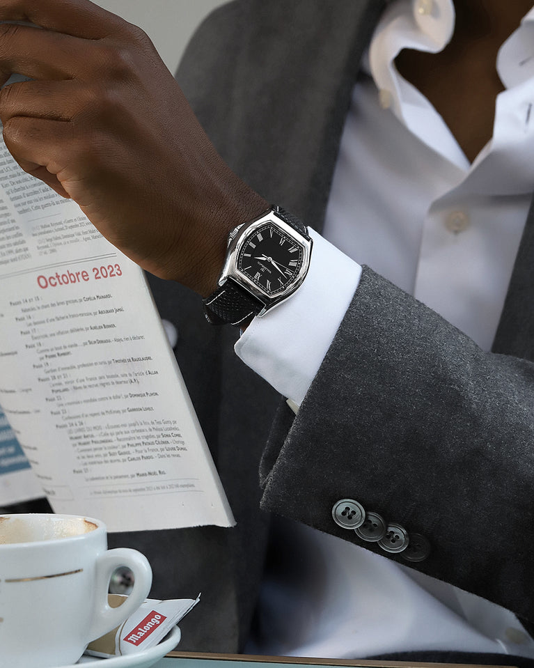 A square mens watch in Rhodium-plated 316L stainless steel from Waldor & Co. with white dial. Ronda movement. The model is Constant 40 Tremezzo 37x45mm.