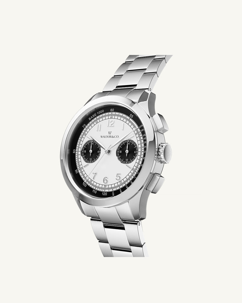 A round mens watch in rhodium-plated silver from Waldor & Co. with black and white sunray dial and a second hand. Seiko movement. The model is Chrono 39 Panda Ltd. Edition