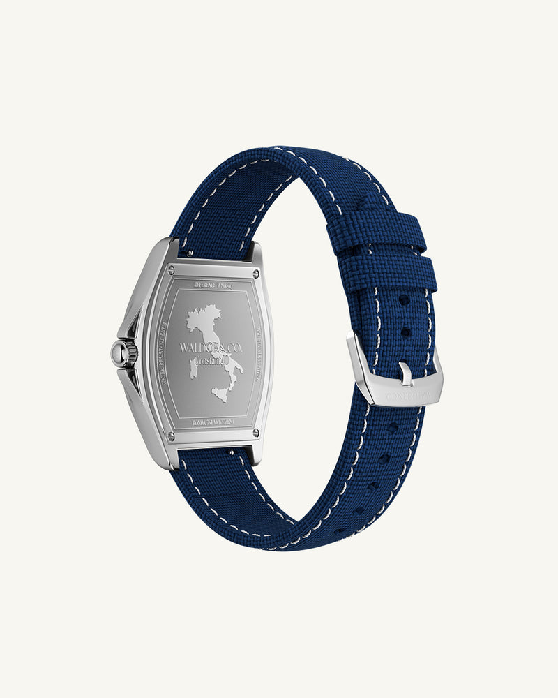A square mens watch in Rhodium-plated 316L stainless steel from Waldor & Co. with white dial. Blue sailcloth strap. Ronda movement. The model is Constant 40 Tremezzo 37x45mm.