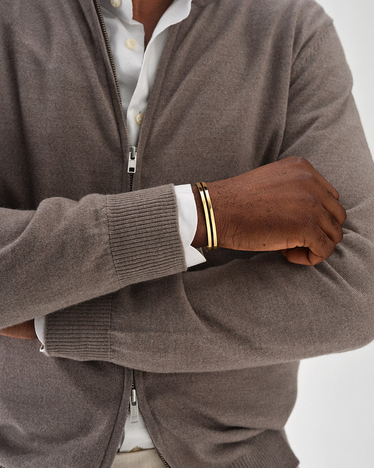 A Bangle in 14k gold-plated 316L stainless steel from Waldor & Co. One size. The model is Dual Bangle Polished.