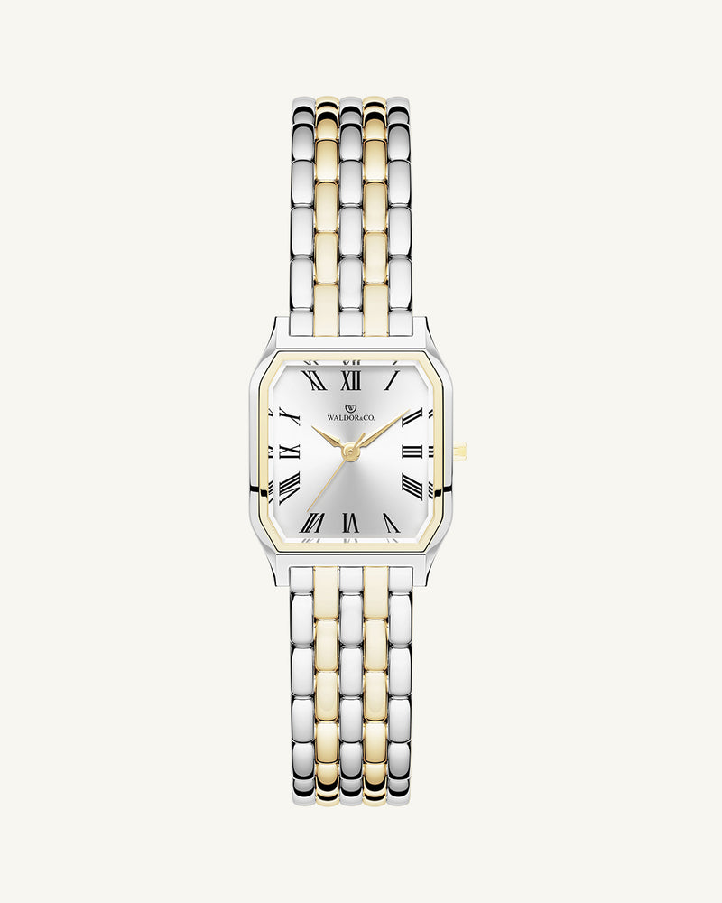 A square womens watch in 22k gold plated 316L stainless steel from Waldor & Co. with white Diamond Cut Sapphire Crystal glass dial. Seiko movement. The model is Eternal 22 Bellagio