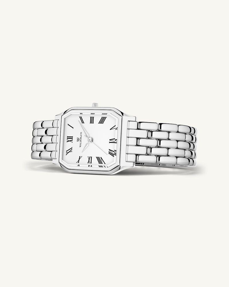 A square womens watch in Rhodium-plated 316L stainless steel from Waldor & Co. with white Diamond Cut Sapphire Crystal glass dial. Seiko movement. The model is Eternal 22 Bellagio.