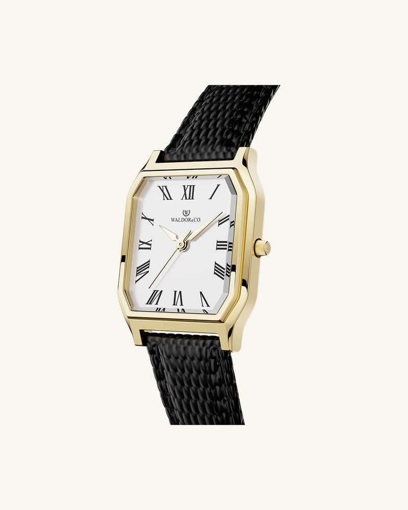 A square womens watch in 22 gold-plated 316L stainless steel with a black genuine leather strap from Waldor & Co. with white Diamond Cut Sapphire Crystal glass dial. Seiko movement. The model is Eternal 22 Varenna.