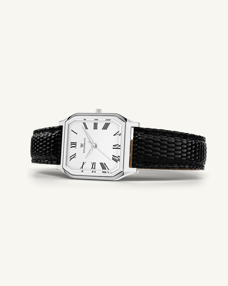 A square womens watch in Rhodium-plated 316L stainless steel from Waldor & Co. with white Diamond Cut Sapphire Crystal glass dial. Strap in black Genuine leather. Seiko movement. The model is Eternal 22 Varenna. 