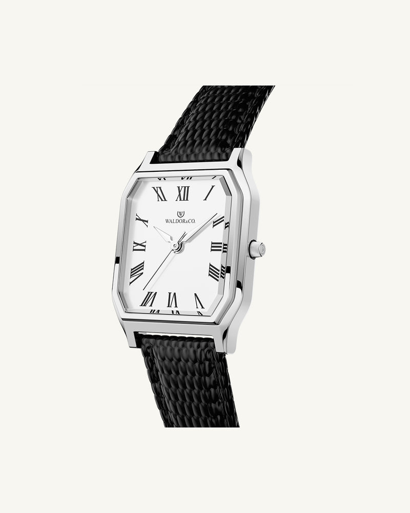 A square womens watch in Rhodium-plated 316L stainless steel from Waldor & Co. with white Diamond Cut Sapphire Crystal glass dial. Strap in black Genuine leather. Seiko movement. The model is Eternal 22 Varenna. 