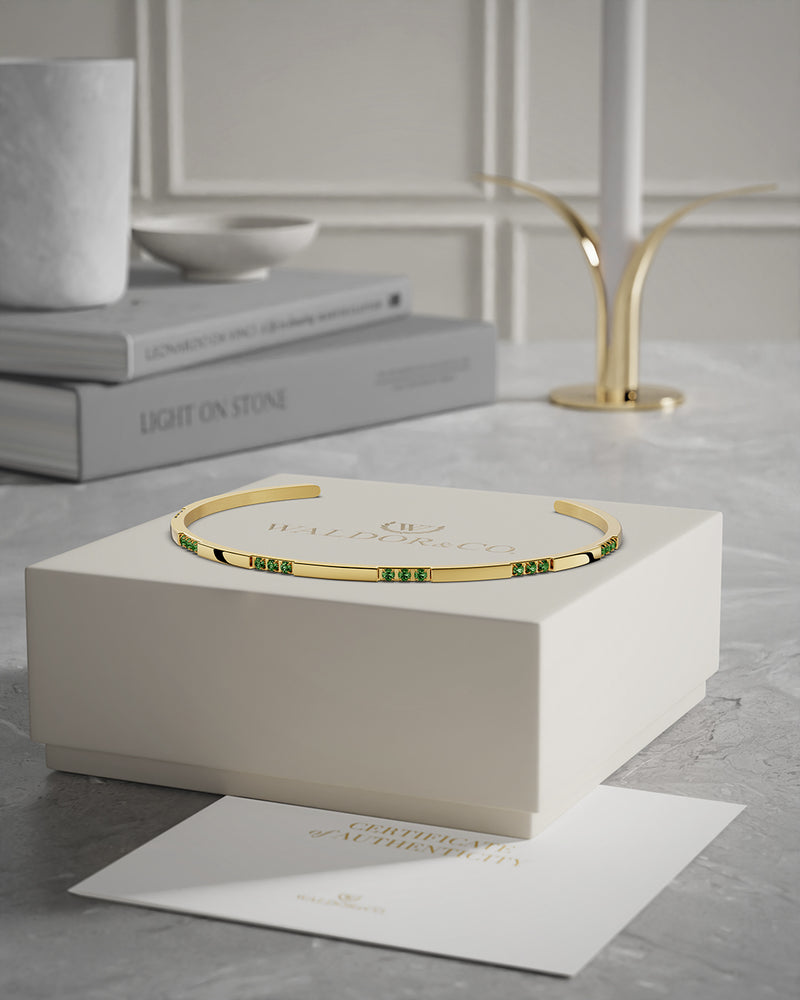 A Bangle in 14k gold-plated 316L stainless steel from Waldor & Co. One size. The model is Opulent Bangle Polished.