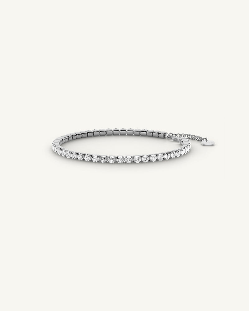 A polished stainless steel chain in silver from Waldor & Co. One size. The model is Tennis Chain Polished