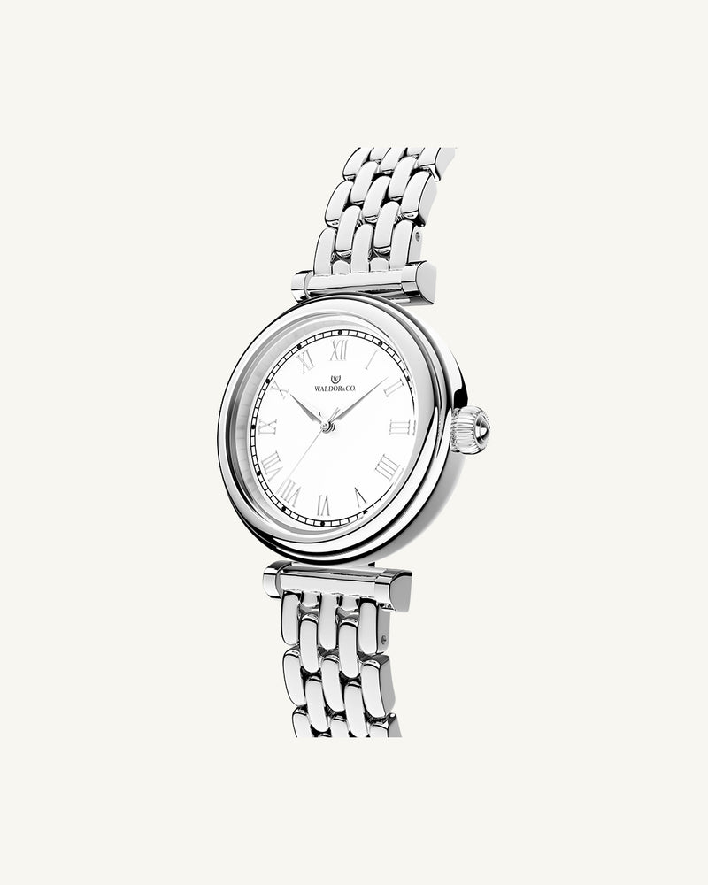 A round womens watch in Rhodium-plated 316L stainless steel from Waldor & Co. with white Sapphire Crystal glass dial. Seiko movement. The model is Venia 24 Villefranche.